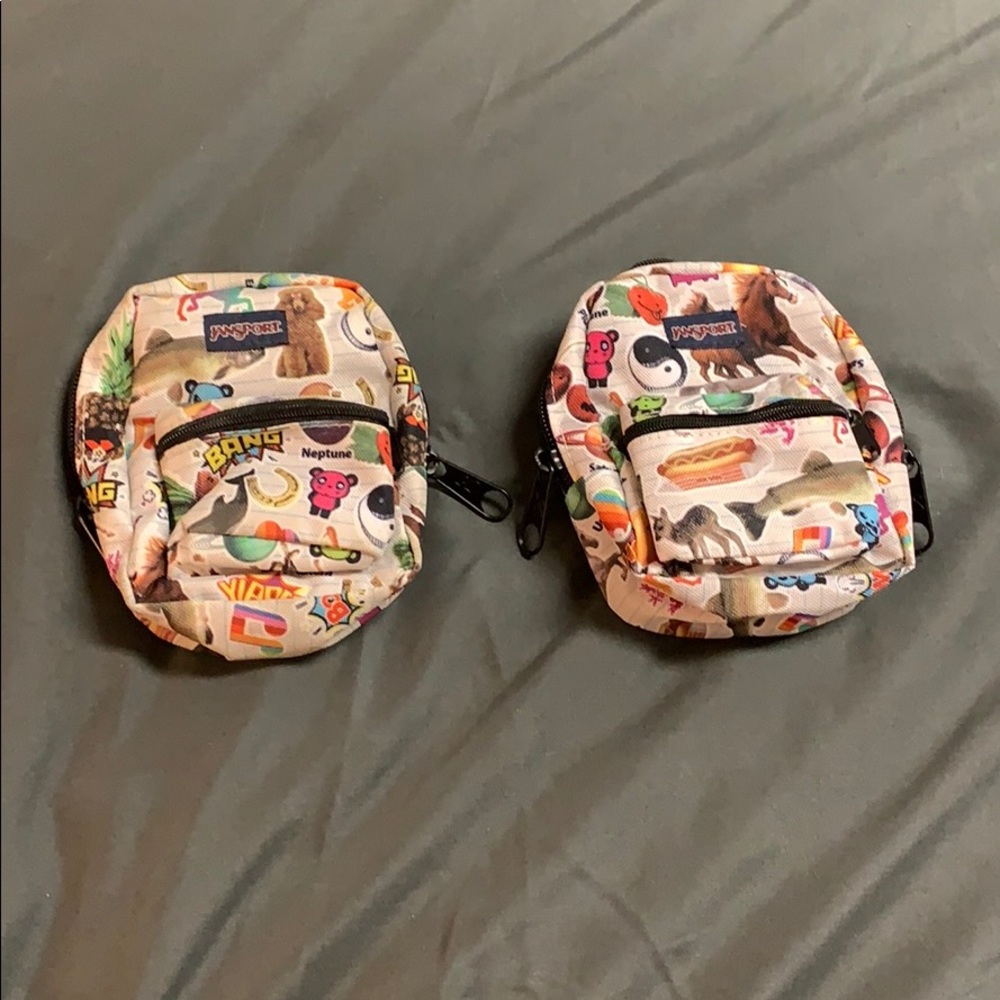 Jan sport mini back pack pouch.